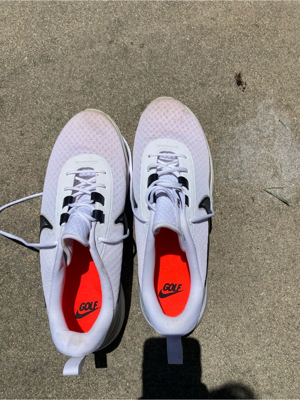 Nike White and Black Athletic Shoes with Red Insoles